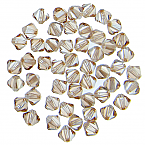 Swarovski 5328 4mm Crystal (001) Golden Shadow Xilion Bicone Beads (Sold in packs of 1 Gross)